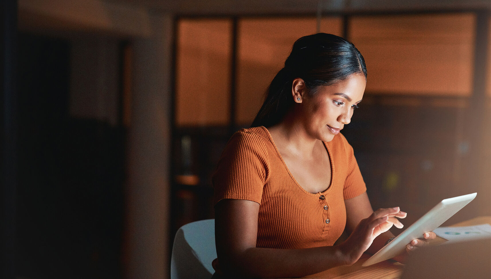 Young Woman Reading on a Tablet